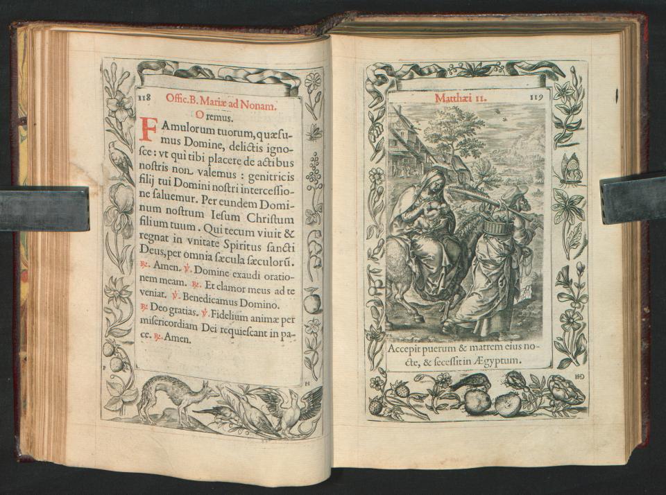De Vlucht naar Egypte met gegraveerde kaders in Officium beatae Mariae Virginis (1573)
